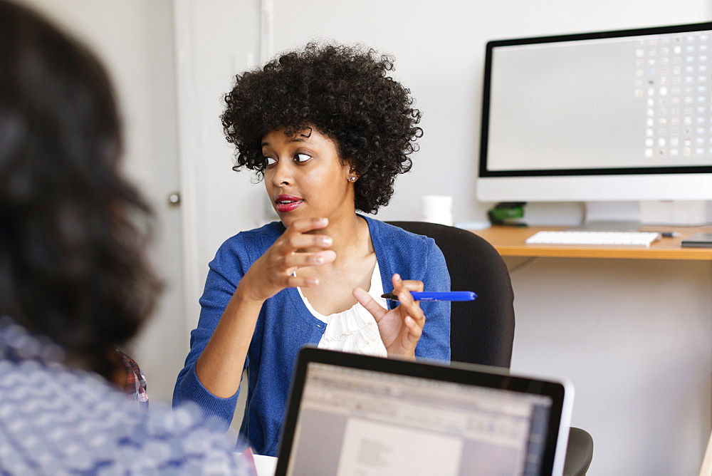 Woman in discussion in Small Business, Start-up