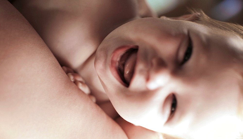 Close up of baby boy laughing