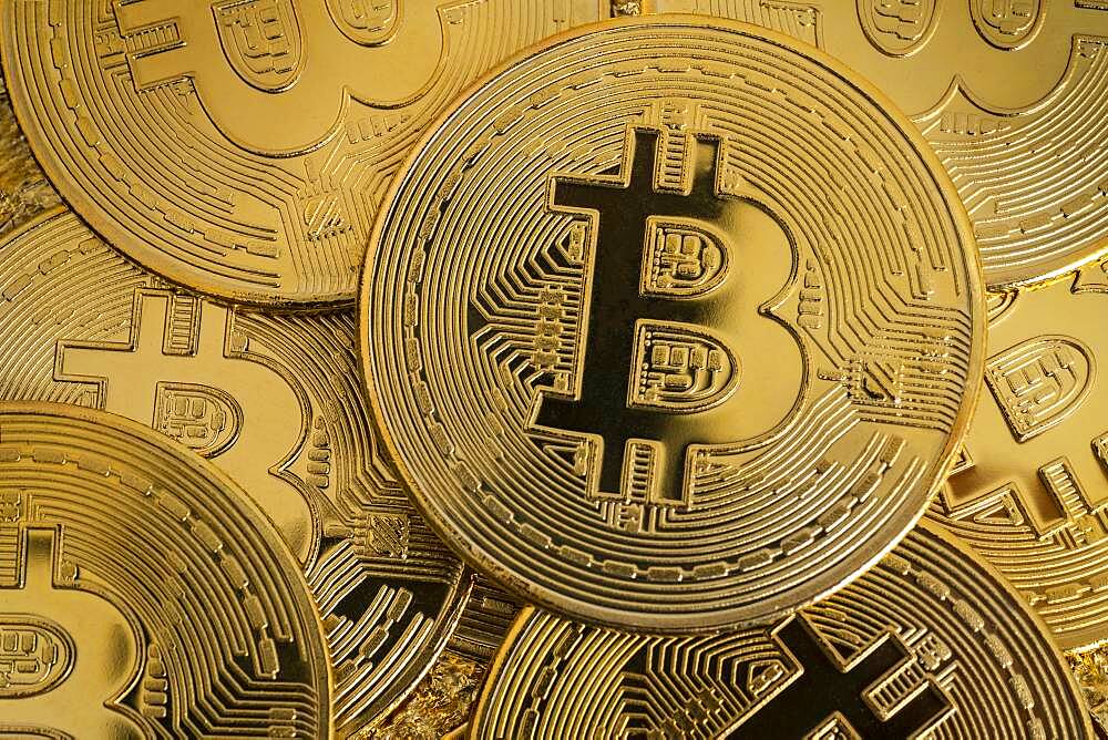 Close-up of golden bitcoins