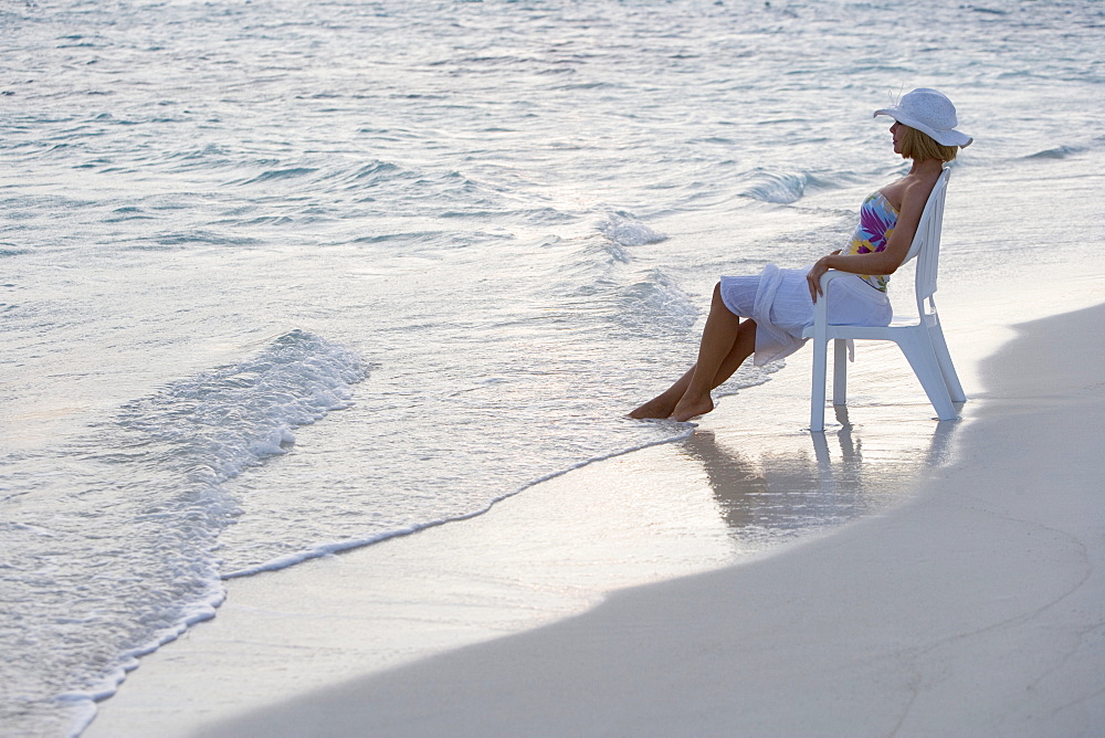 Woman sitting at the beach