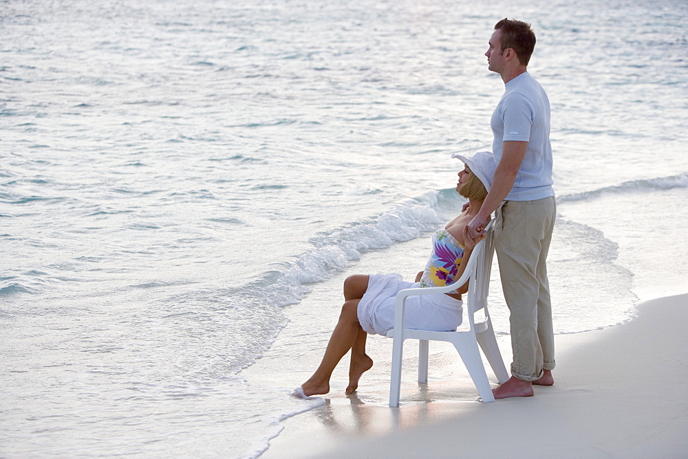 Couple relaxing at the beach