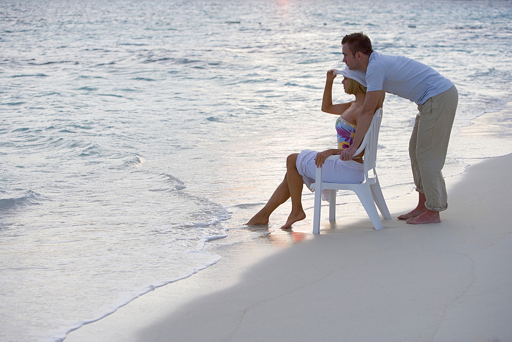 Couple relaxing at the beach