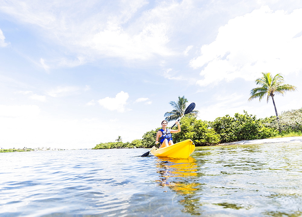 Woman kayaking, Jupiter, Florida