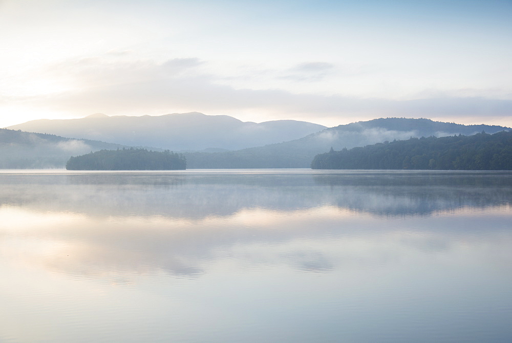 Usa, New York State, North Elba, Morning fog over Placid Lake