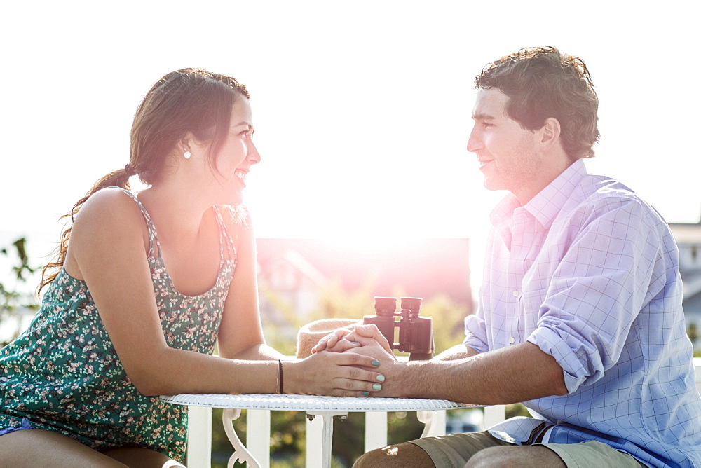 Side view of young man and woman looking at each other, USA, Washington, Everett 