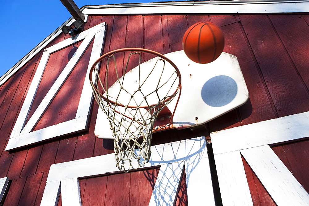 Basketball outside barn, Pennsylvania