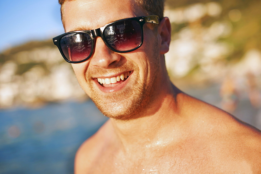 Portrait of young man at beach