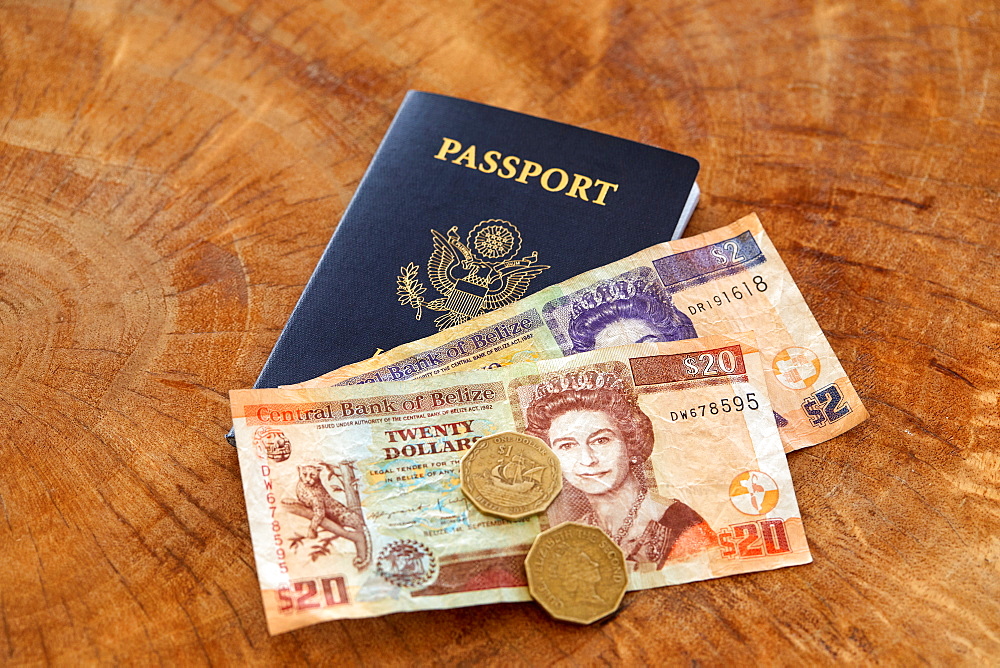 Passport and Belizian currency