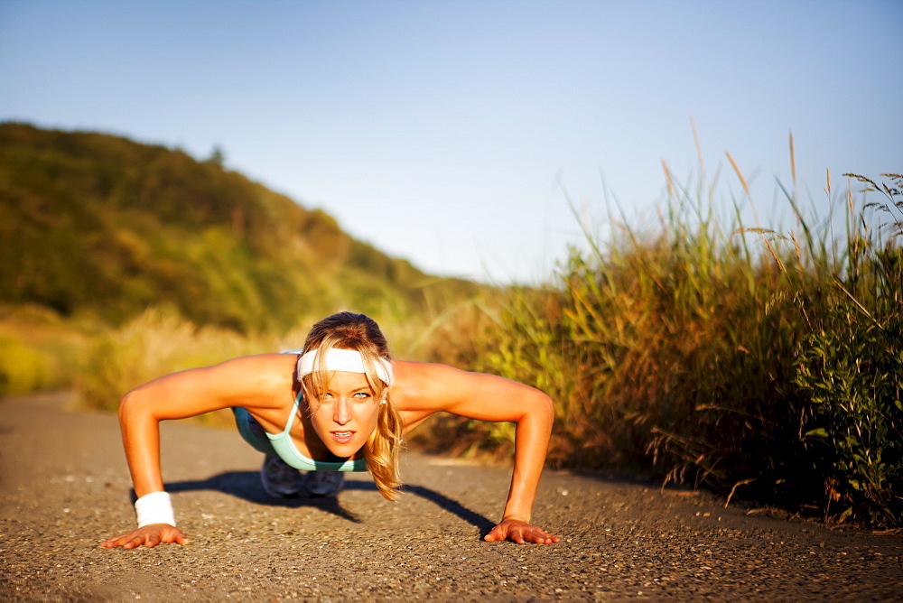 Runner doing push ups