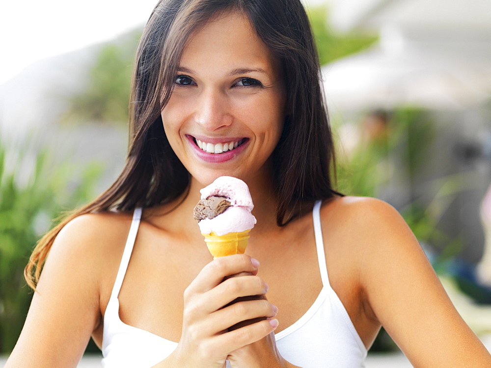 Woman eating ice cream cone