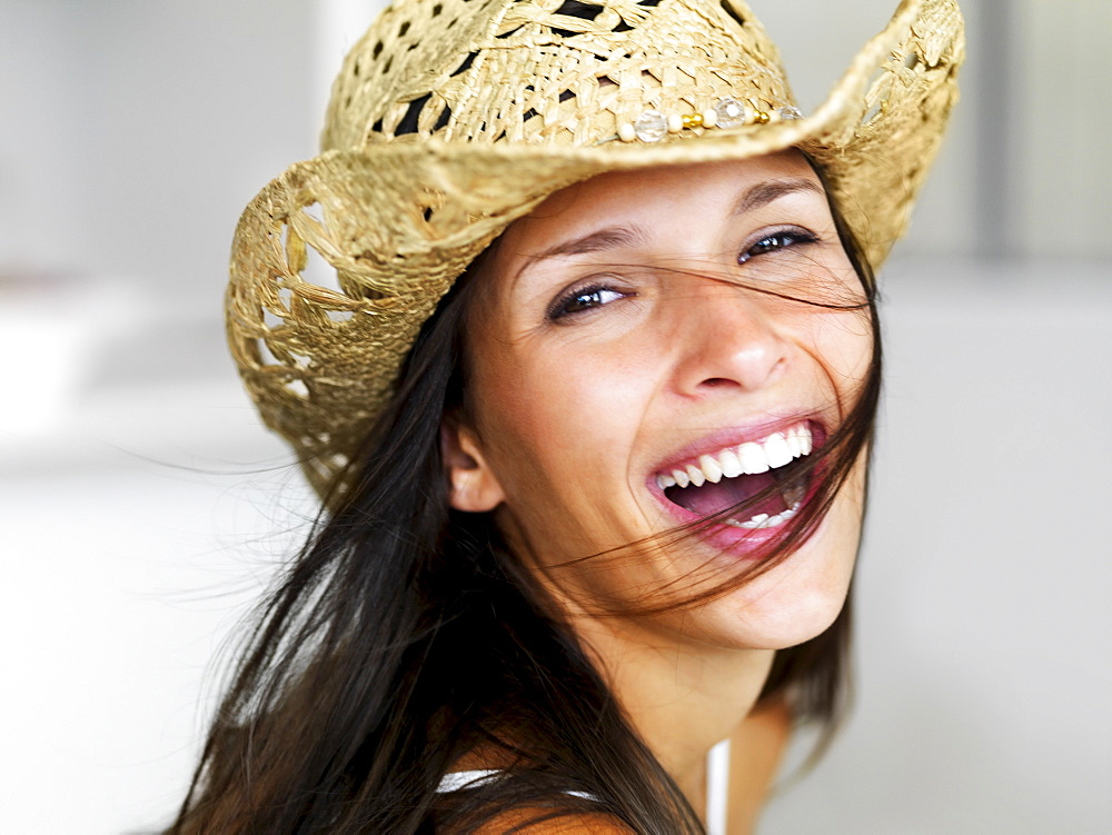 Woman wearing straw hat