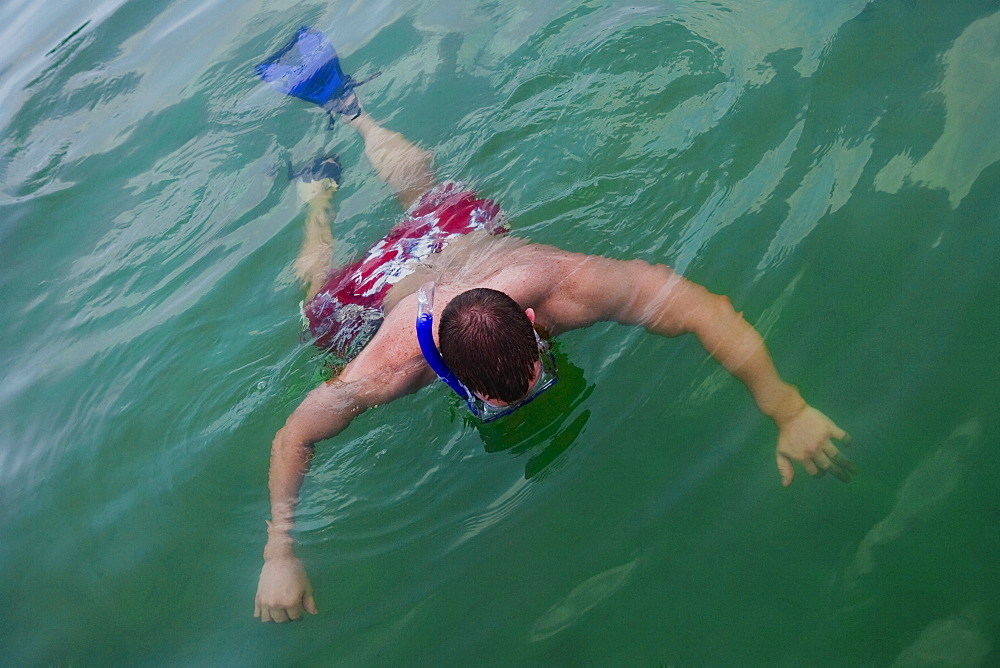 Man snorkeling in water