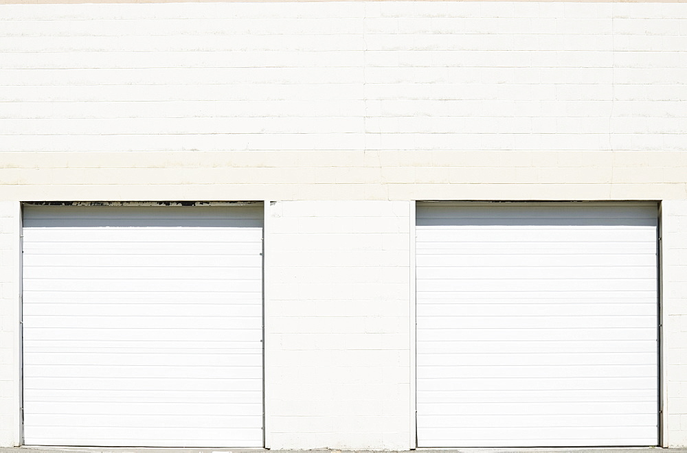 Close-up shot of closed roller doors of warehouse