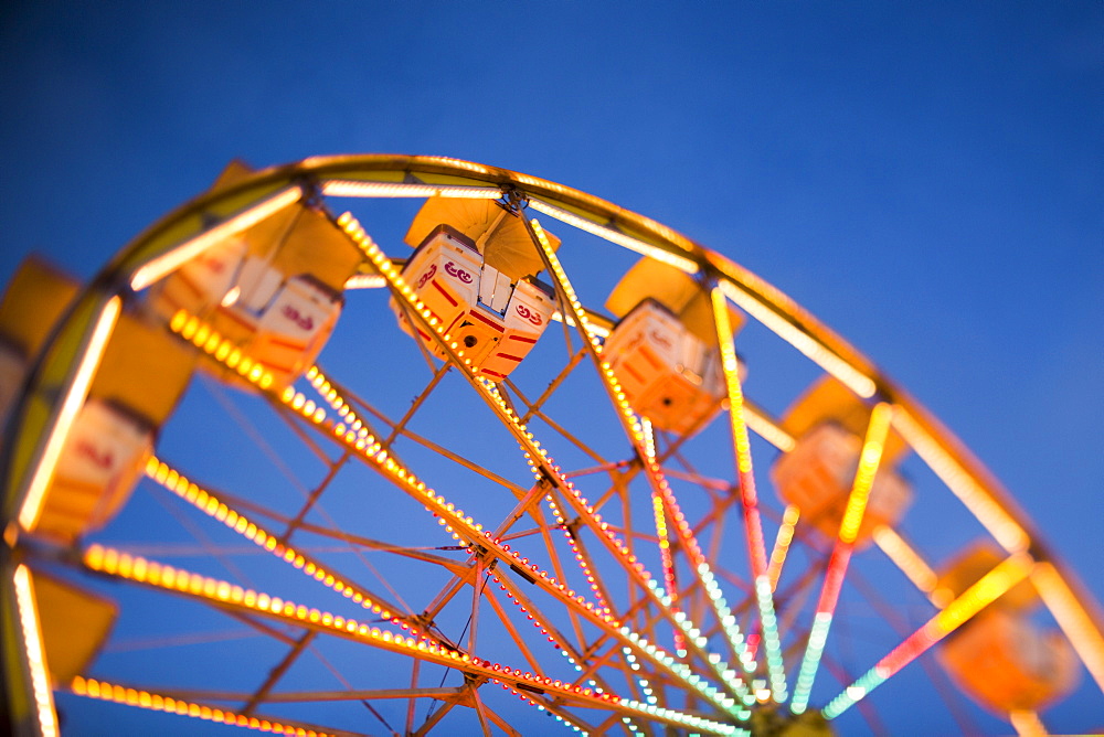 Ferris wheel in amusement park at dusk, USA, Utah, Salt Lake City 