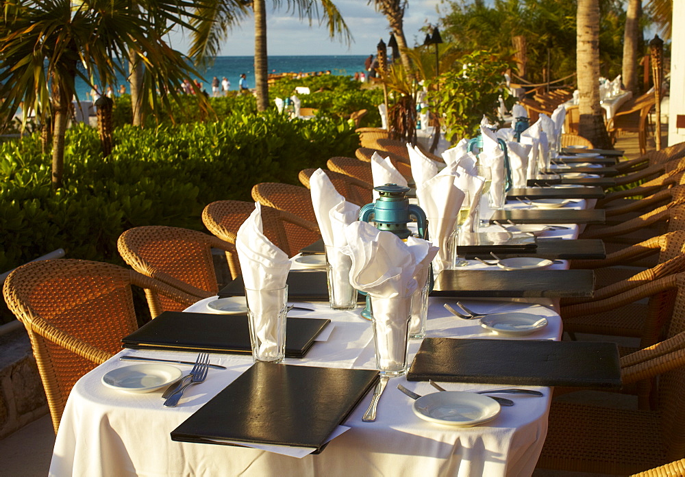 Beach resort outdoor restaurant table settings, Turks & Caicos, Providenciales