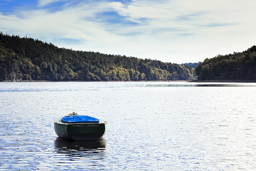 France, Brittany, Morbihan Department, Lac de Guerledan, Small boat on lake