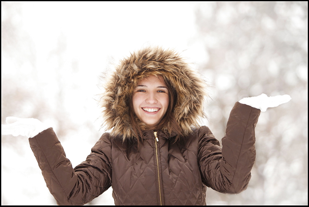 USA, Utah, Lehi, Portrait of young woman wearing winter coat outdoors