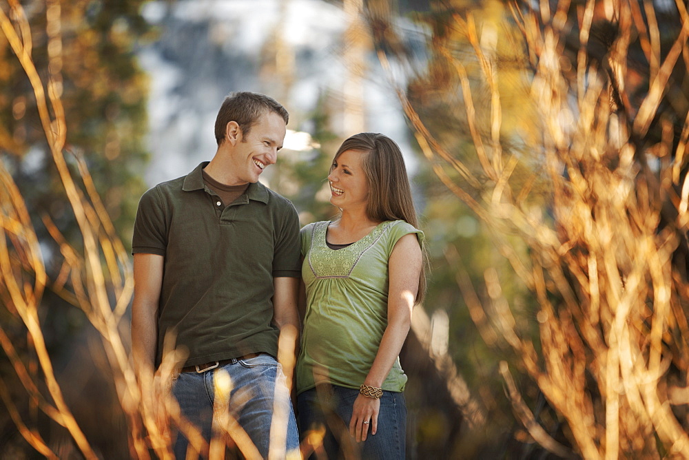 Happy couple walking outdoors together