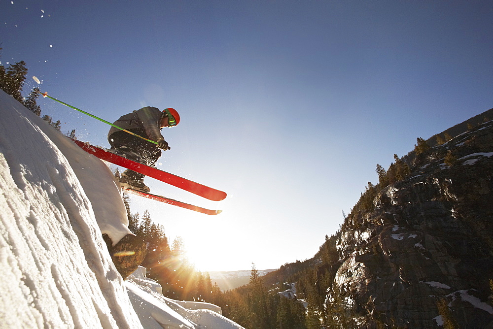 Skier mid jump in Aspen Colorado