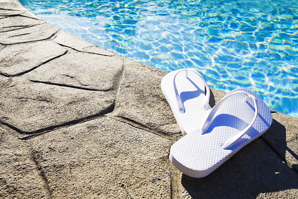 Flip flops by the pool