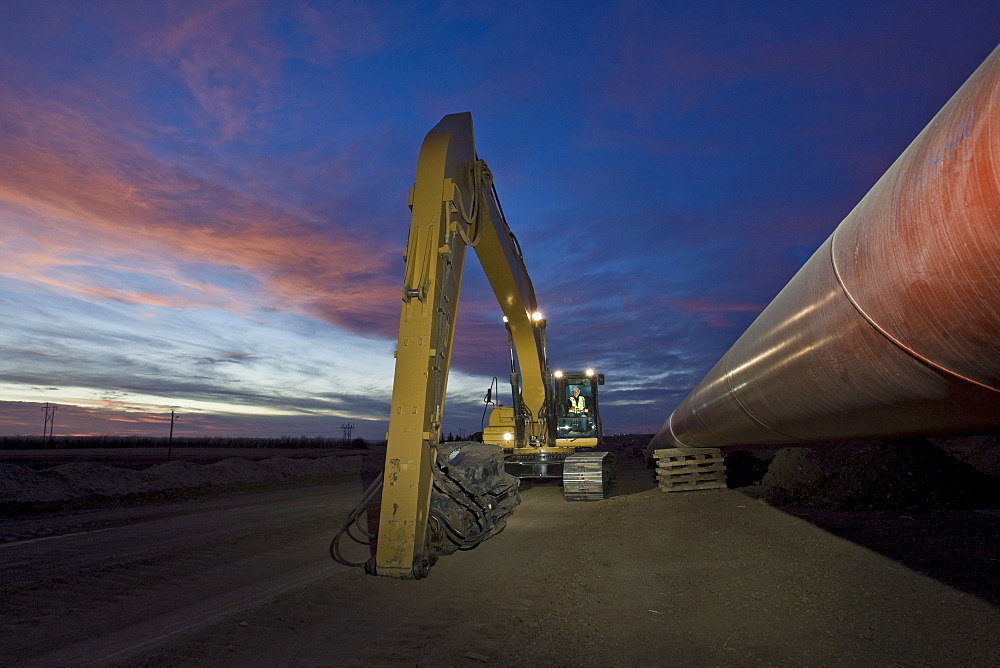 Heavy equipment beside pipeline