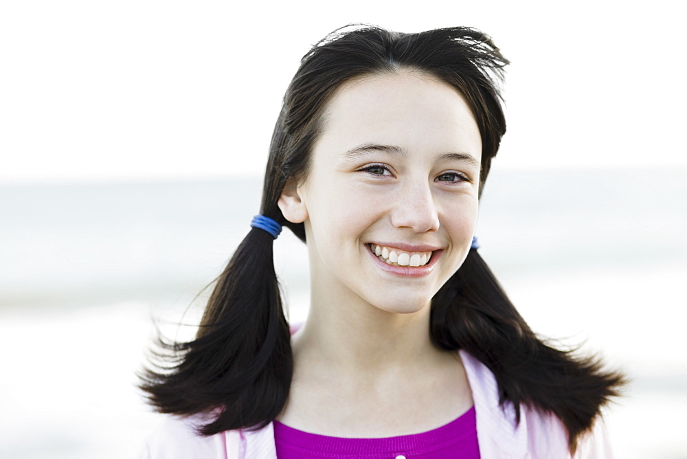 Young girl with pony tails