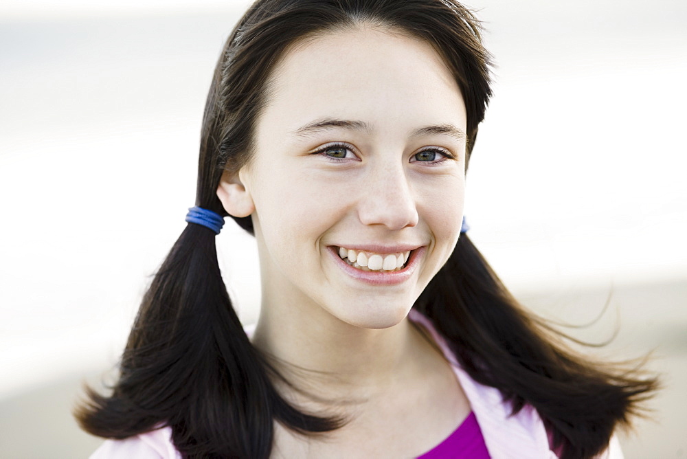 Young girl with pony tails