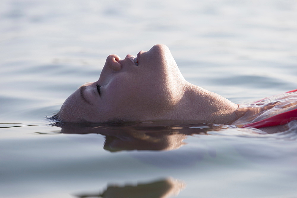 Woman relaxing in lake