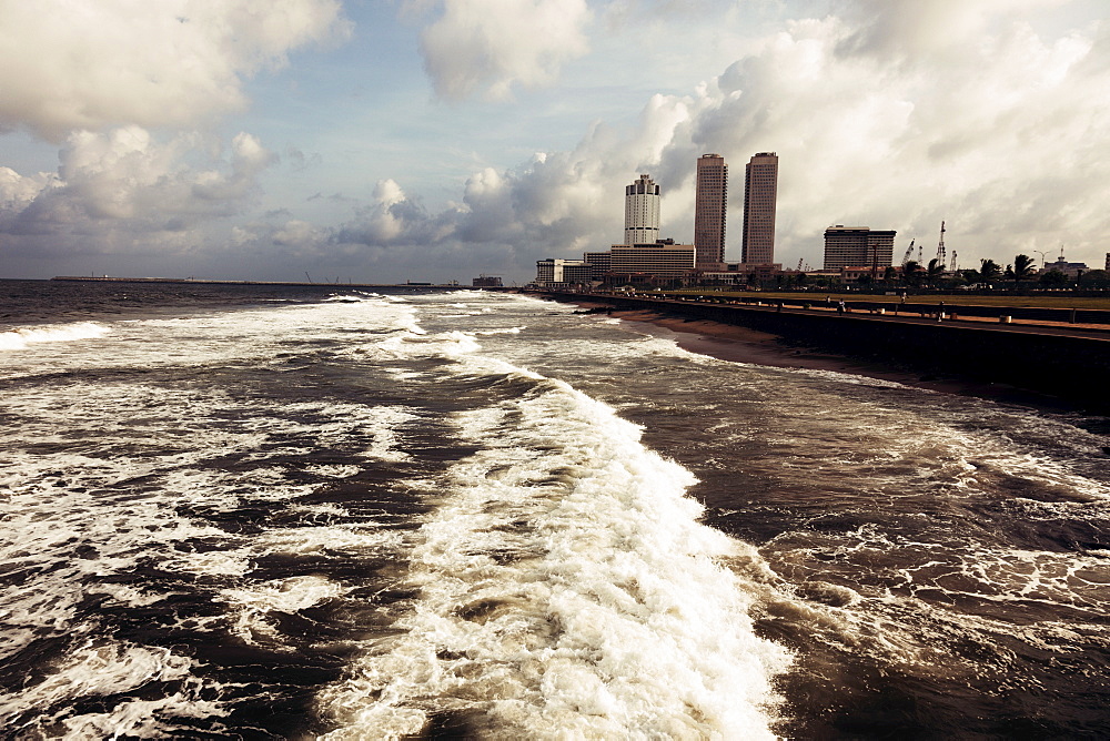 Waves of Indian Ocean and city skyline, Sri Lanka, Colombo 