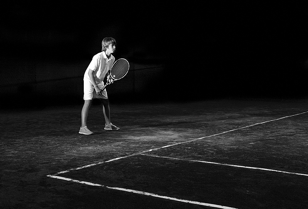 Boy playing tennis, Texarkana, AR