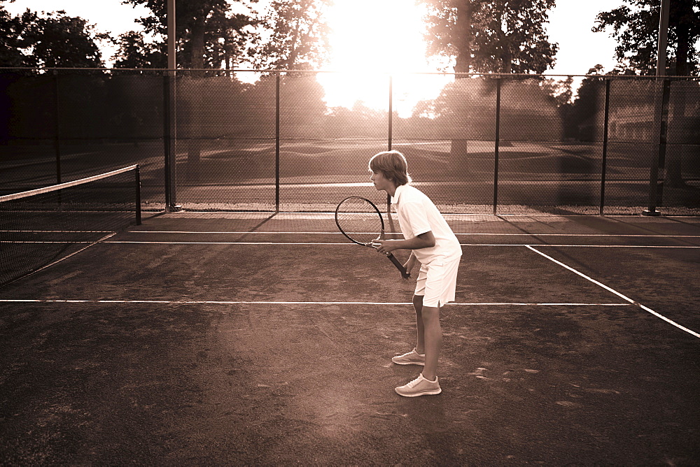 Boy playing tennis, Texarkana, AR