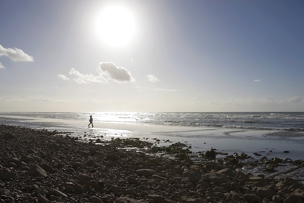 France, Pas-de-Calais, Escalles, Lonely walker on beach, France, Pas-de-Calais, Escalles