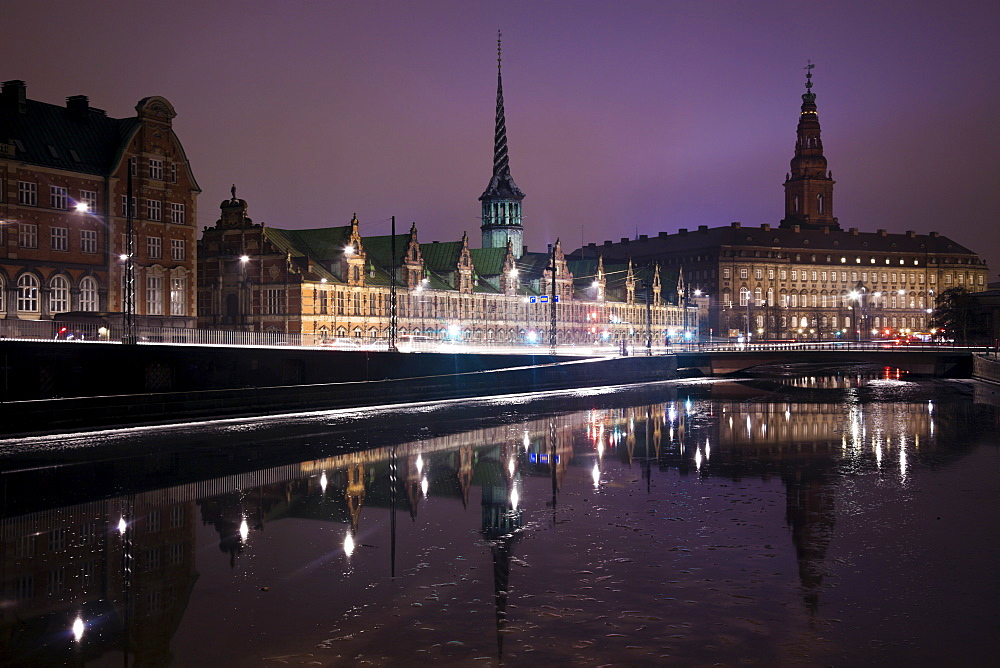 View over canal towards Copenhagen Stock Exchange and Christiansborg Castle