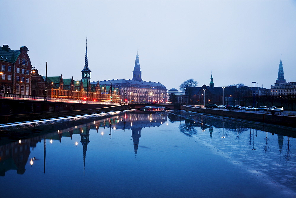 View over canal towards Copenhagen Stock Exchange and Christiansborg Castle