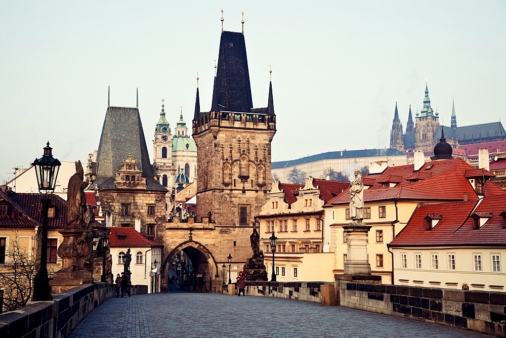 View over Charles Bridge towards Prague Castle in early morning