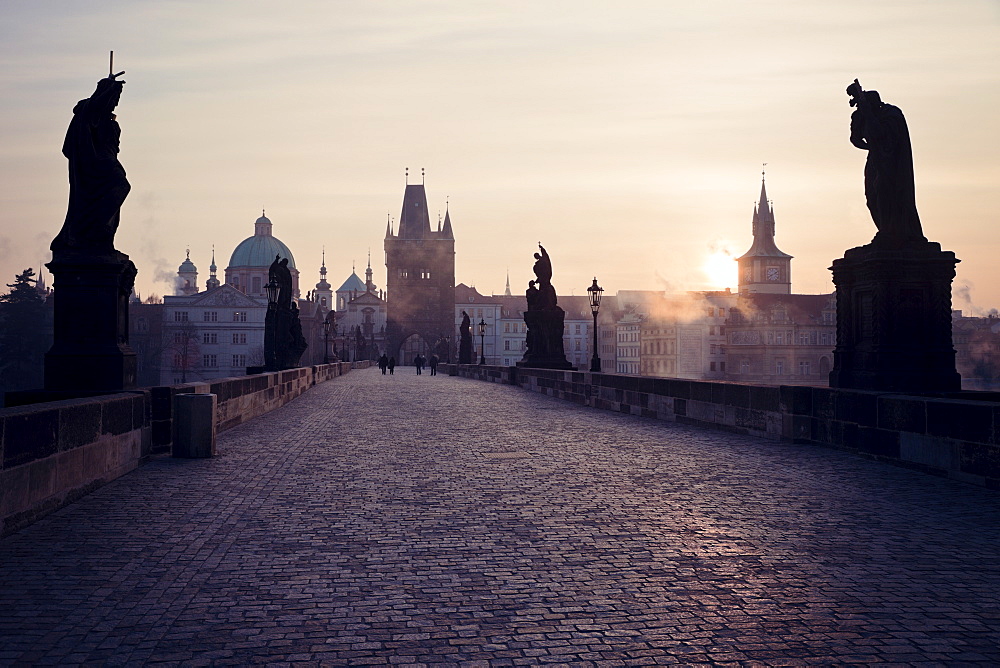 View over Charles Bridge towards Prague Castle in early morning