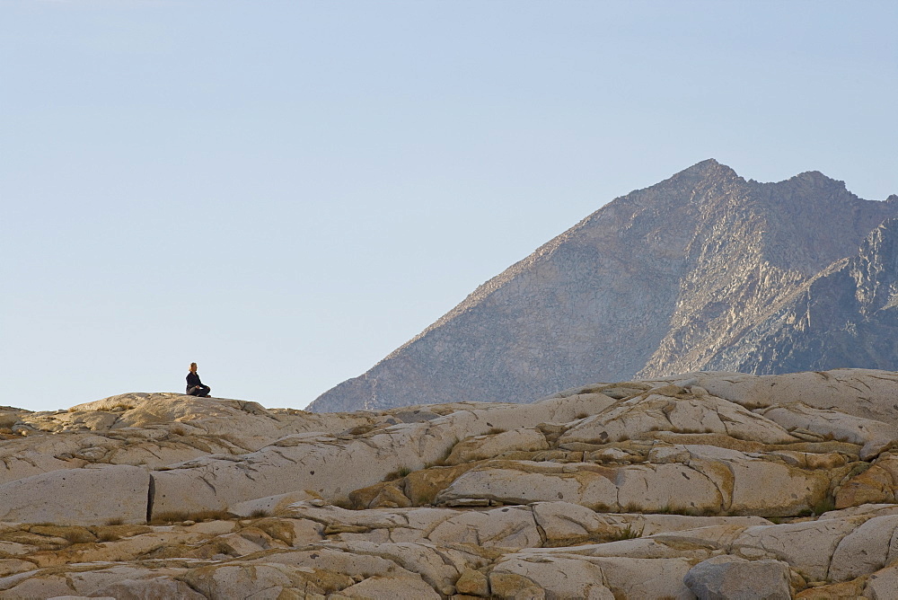 USA, California, Sequoia National Park, Mid adult woman meditating