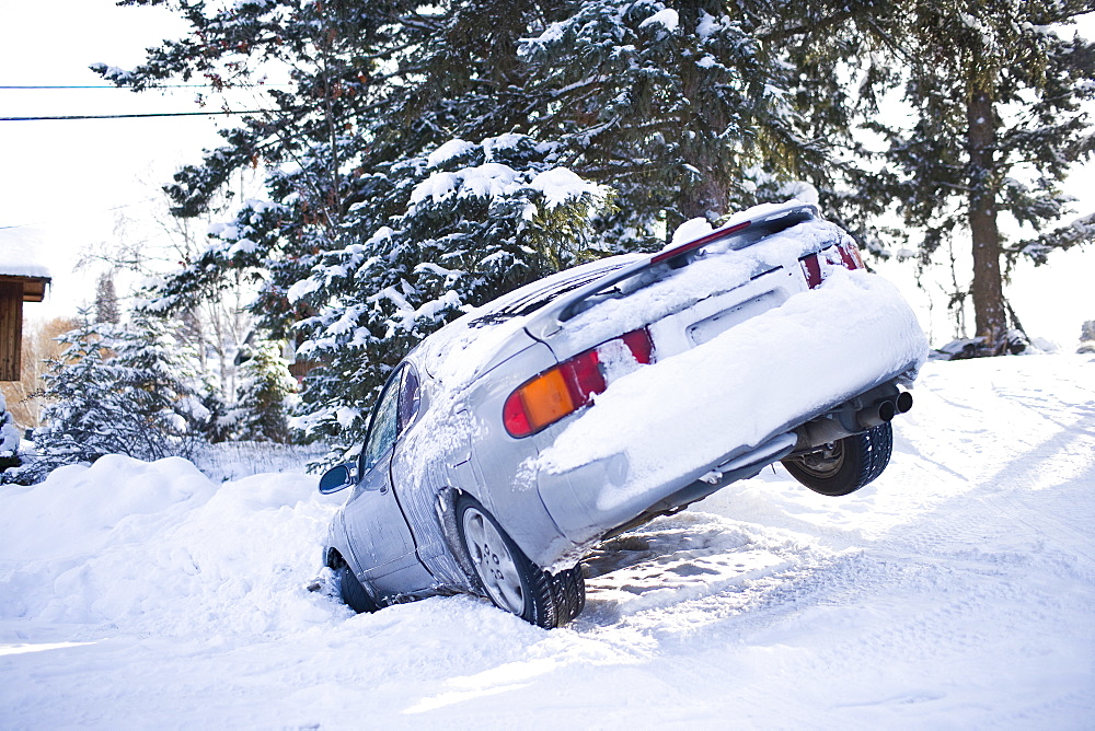 USA, Montana, Car buried in snow