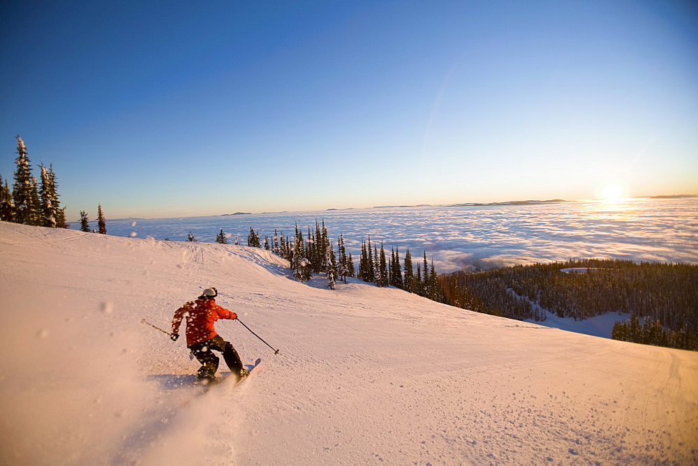 USA, Montana, Whitefish, Mid adult man skiing
