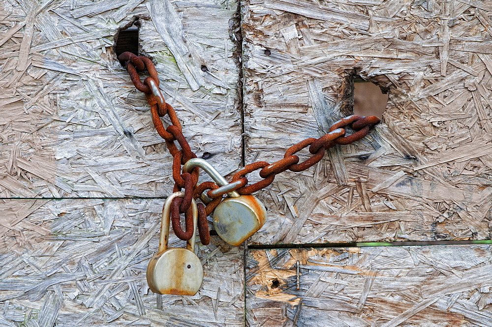 Chain and padlocks on old door