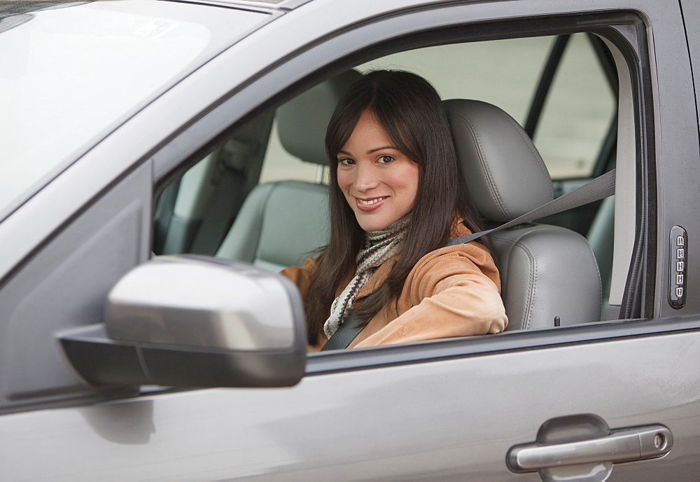 Portrait of woman driving car