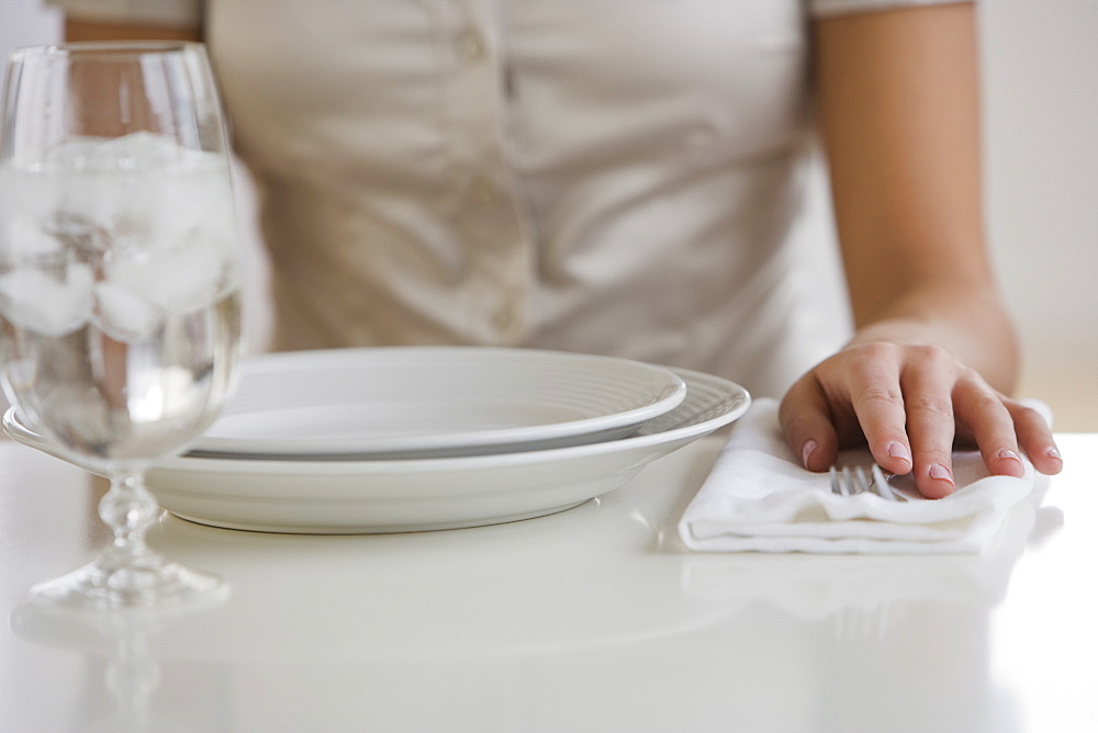 Close up of woman sitting at table