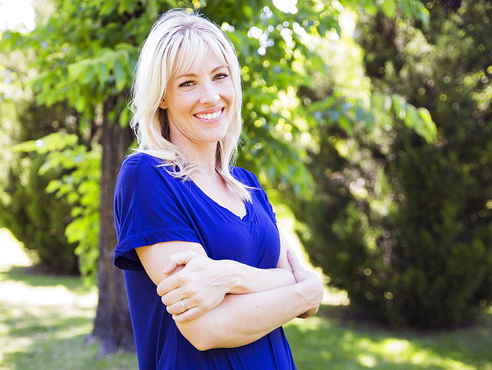 Portrait of blonde woman in park, USA, Utah, Salt Lake City 