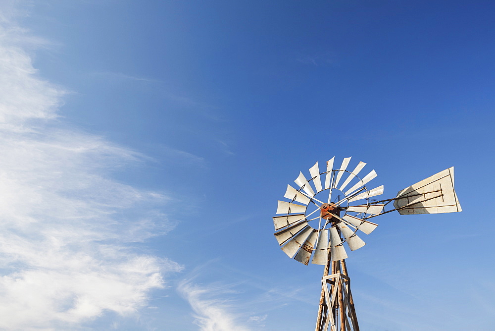 Windmill against blue sky, USA, South Dakota, Okaton