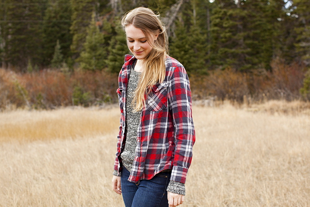 Portrait of young woman in non-urban scene, Salt Lake City, Utah