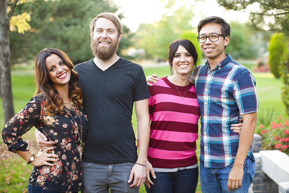 Portrait of group of friends in park, Salt Lake City, Utah