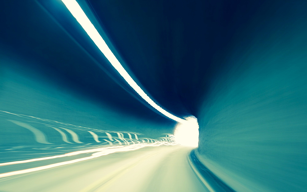 Car driving through Elk Creek Tunnel, Oregon