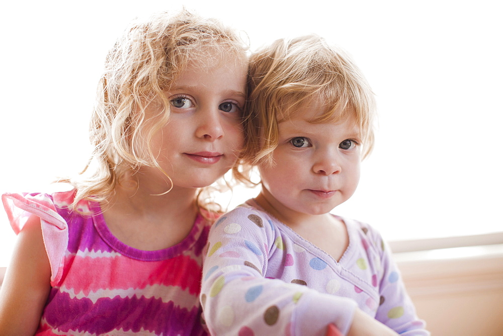 Portrait of two girls with blond hair