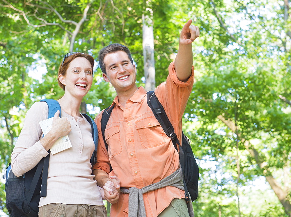 Couple hiking in forest, USA, New Jersey, Mendham
