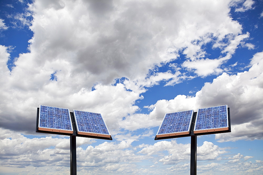 Two solar panels on sky background